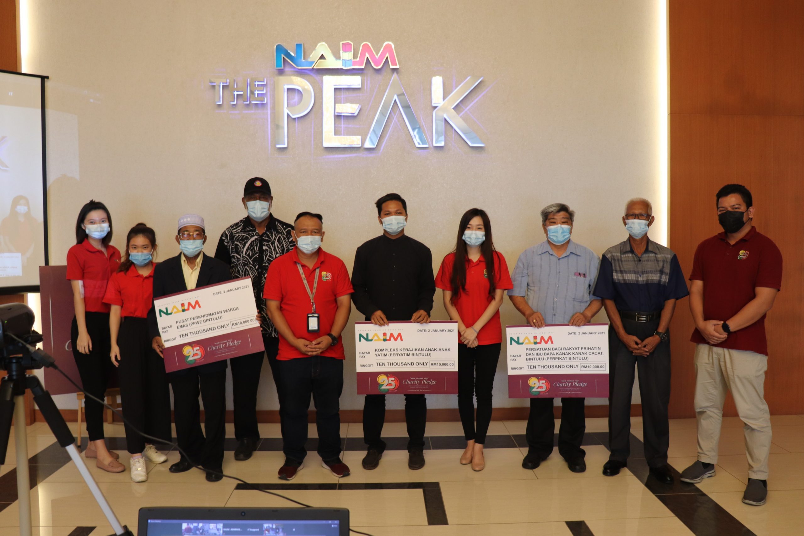 Recipients thank Naim for donations