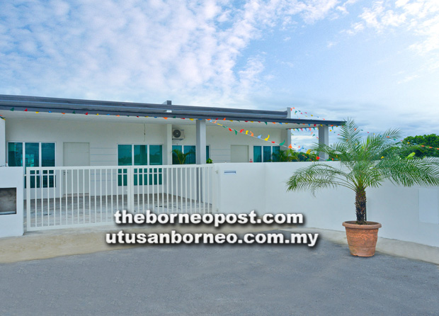 Naim presents house to grand prize winner